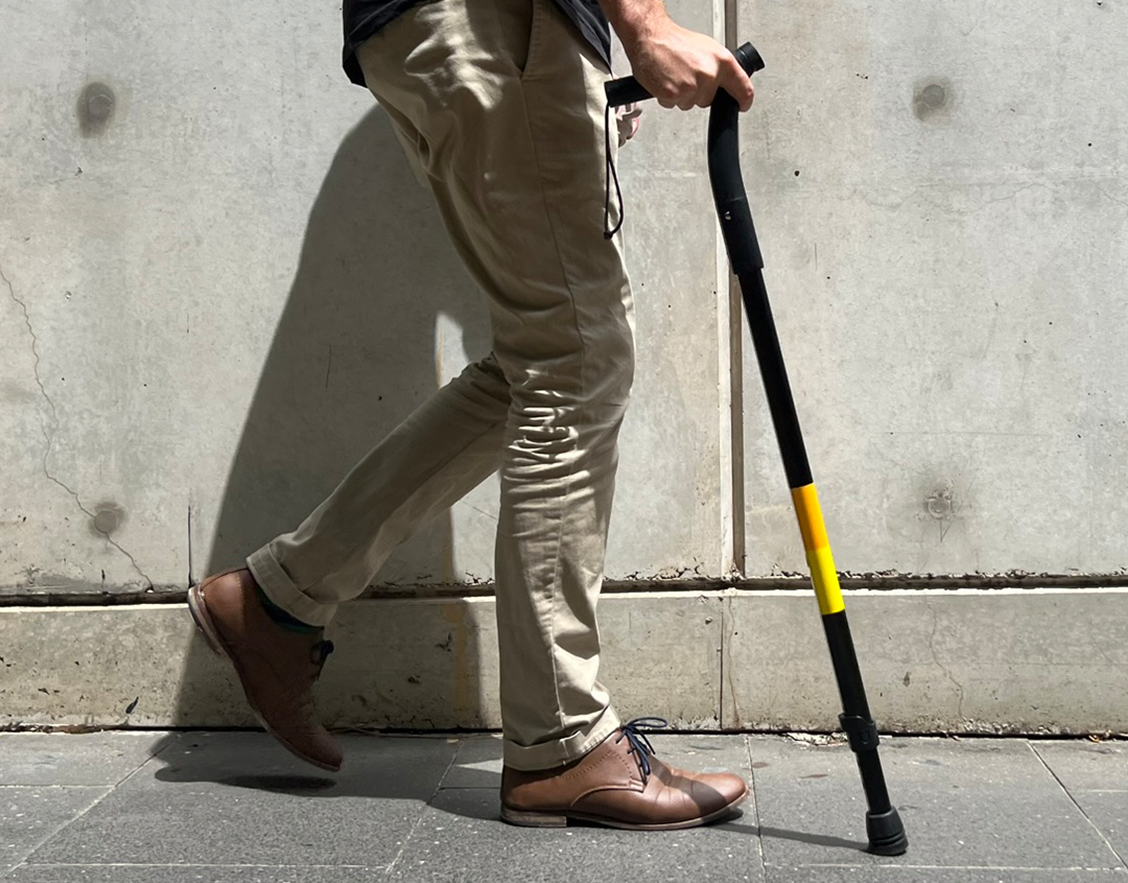 Person walking with the Upperstate cane.